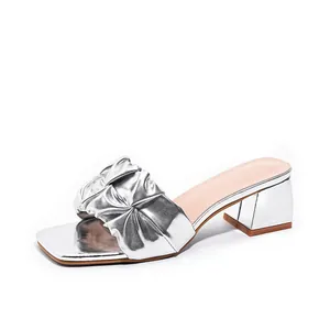 Fashionable silver metallic high heel slide sandals with pleated ruffled strap