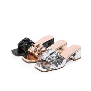 Elegant block heel sandals with metallic ruched straps in black gold and silver