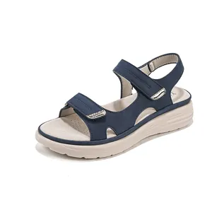 Stylish sporty blue leather wedge sandals for women featuring adjustable velcro straps