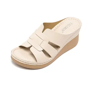 Elegant cream women's wedge sandals with woven straps and soft padded insoles