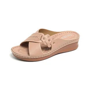 Comfortable beige wedge sandals for women with laser-cut hollow straps and soft insole.