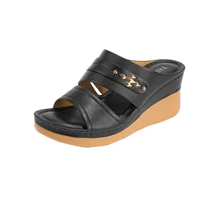 Elegant women's black wedge sandals featuring gold metal accent and platform heel