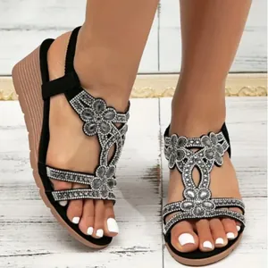 Elegant Bohemian black wedge sandals with sparkling rhinestone floral decorations