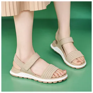 Close-up view of khaki flyknit sports sandals for women featuring soft TPR soles
