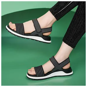 Detailed view of breathable flying woven sports sandals for women with soft white TPR soles