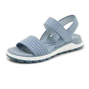 Detailed view showing breathable flyknit upper and soft TPR sole of blue athletic sandal