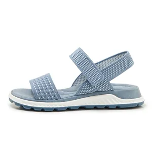 Side view of breathable blue knit women's sport sandals with flexible TPR sole