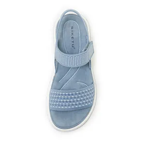 Top view of blue flyknit sports sandal featuring breathable knit texture and soft sole