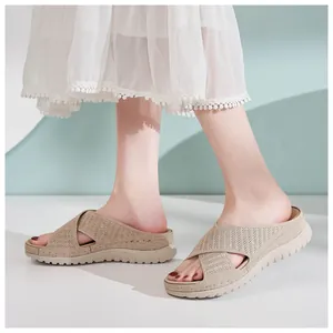 Detail shot of women's beige flying woven casual sandals with hollow platform sole