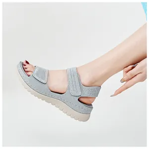 Comfortable grey knit sports sandals with velcro straps and thick platform sole for women