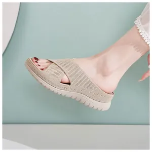 Detailed view of women's breathable knit wedge slide sandal with hollowed cross straps