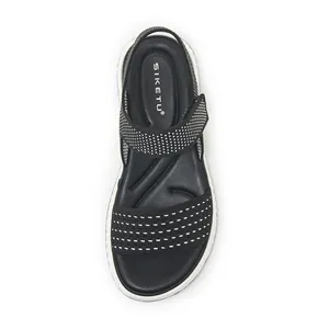 Top view detail of lightweight black and white flyknit women's sports sandal with TPR sole