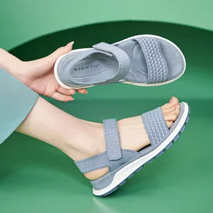 Comfortable and breathable women's light blue knit sports sandals with soft TPR sole