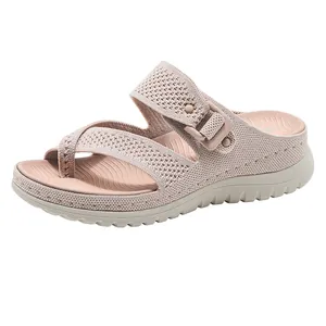 Detailed side view of women's mesh platform sandals in soft beige featuring buckle detail