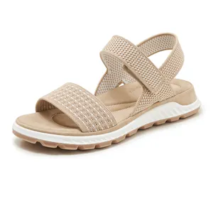 Breathable beige fly-knit women's athletic sandals with comfortable soft TPR sole.