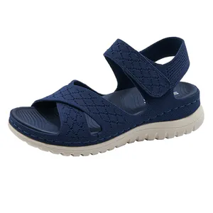 Detail of women's navy blue breathable mesh platform sandal with hook-and-loop strap