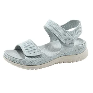 Light blue breathable mesh sports sandals featuring adjustable hook-and-loop straps and thick sole