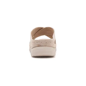 Detailed rear view of beige knit athletic slide sandals for women featuring a comfortable thick sole