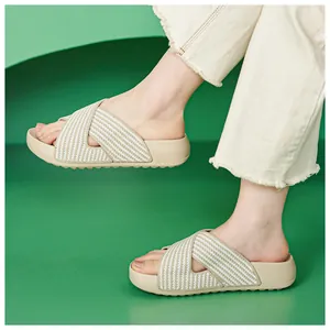 Close-up of lightweight platform sandals with breathable woven cross straps in beige