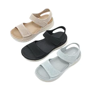 Detailed view of breathable mesh women's sporty sandals in beige, black and light blue