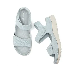 Light blue women's sporty sandals with breathable mesh and adjustable velcro straps