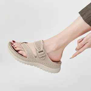 Beige women's breathable knit sport sandals with adjustable velcro strap and thick sole