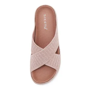 Detailed top view of pink flying woven casual women's slide sandal with thick sole