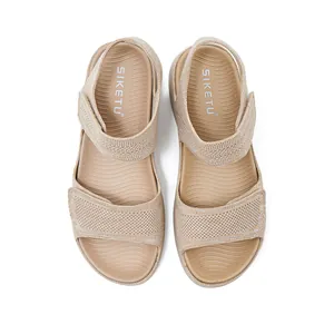 Top view of beige sporty sandals featuring breathable hollow knit straps and platform sole design