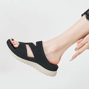 Women's black athletic platform sandals featuring a breathable hollow out design for casual wear