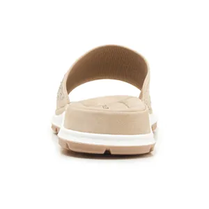 Rear view of comfortable beige fly-knit flat slides with sparkling rhinestone upper