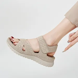 Women's beige sporty casual sandals featuring knit hollow-out design and comfortable thick sole