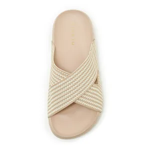 Overhead detail view of beige criss-cross fabric strap slide sandal with soft comfort footbed