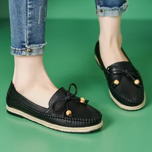 Comfortable black women's casual loafers with bow detail and jute-wrapped soft sole