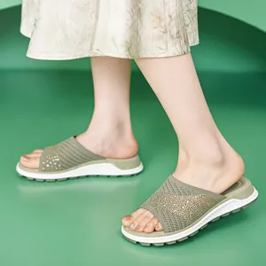 Stylish olive green flyknit slide sandals with sparkling rhinestone accents for women