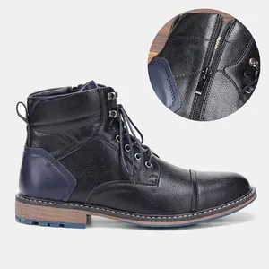 Detailed view of vintage rubbed leather men's Martin boots with side zipper and laces