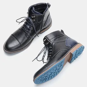 Détails des bottines Martin en cuir pour homme avec fermeture éclair et semelle bleue