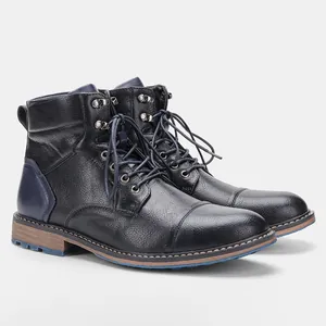 Vue latérale détaillée des bottines en cuir noir pour hommes avec touches de bleu