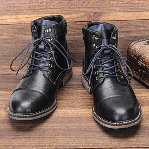 Front view of retro distressed black leather men's Martin boots with side zippers detail