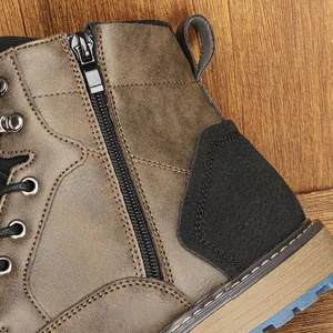 Detail of the side zipper and distressed leather on a vintage men's Martin boot