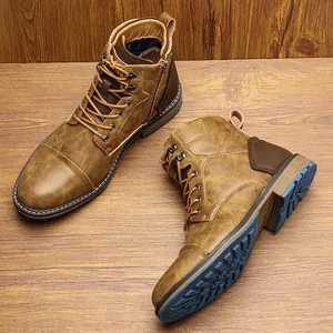 Close-up of vintage burnished brown men's Martin boots with side zipper detail