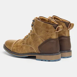 Detailed rear view of vintage burnished leather Martin boots with side stitching