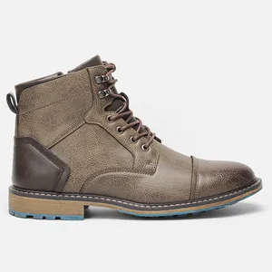 Vue de profil de bottines vintage marron pour hommes avec bout rapporté classique