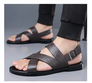 Close-up detail of men's leather sandals featuring soft anti-slip soles for beach wear