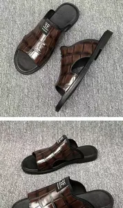Detail view of premium brown faux crocodile pattern on men's casual beach sandals