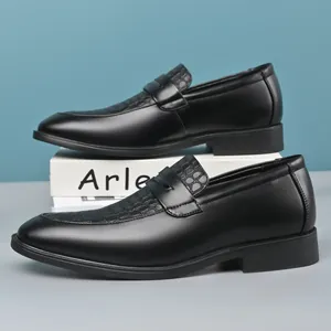 Close-up of black men's loafers featuring textured leather and classic British style