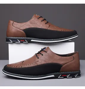 Vista dettagliata di scarpe casual da uomo marroni e nere con eleganti dettagli brogue.