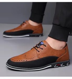 Dettaglio scarpe brogue casual da uomo in marrone e nero disponibili in taglie forti