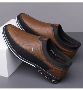 Dettaglio macro di scarpe da uomo in pelle marrone business slip-on casual
