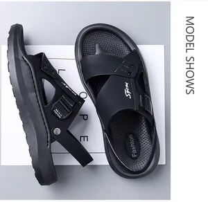 Close-up detail view of black men's non-slip sport sandals for beach and casual wear