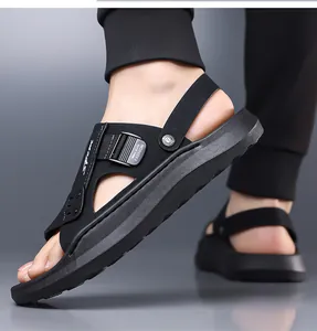 Close-up side view of men's black sporty sandals with adjustable strap and soft thick sole